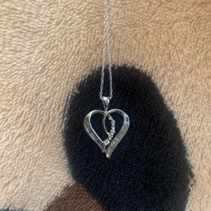 White gold and diamond heart pendant